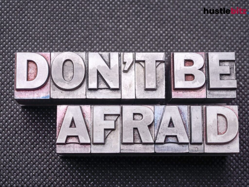 Metal block letters spelling "Don't be afraid."