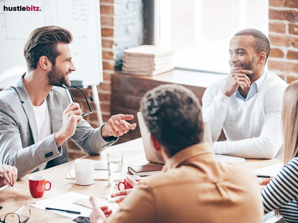 A professional team having an engaging conversation at a table.