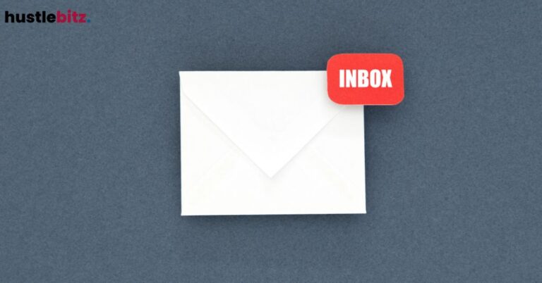 An envelope with a red "INBOX" notification on a gray background.