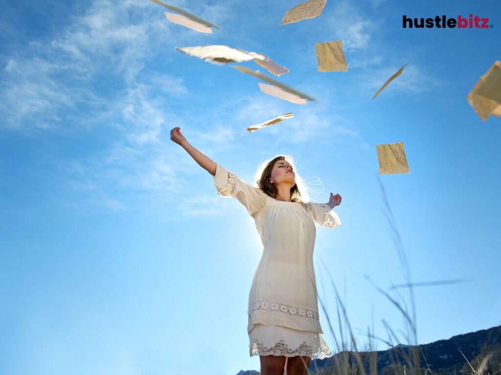 A woman joyfully throws papers into the sky, embracing freedom.