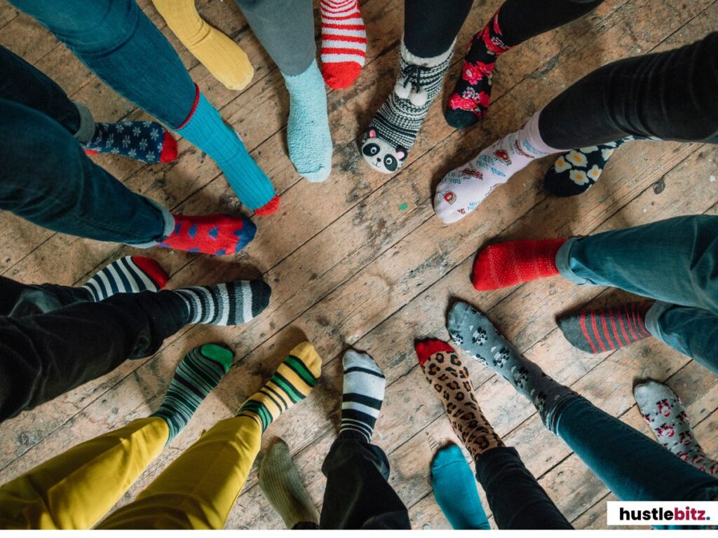 Group of people wearing mismatched socks