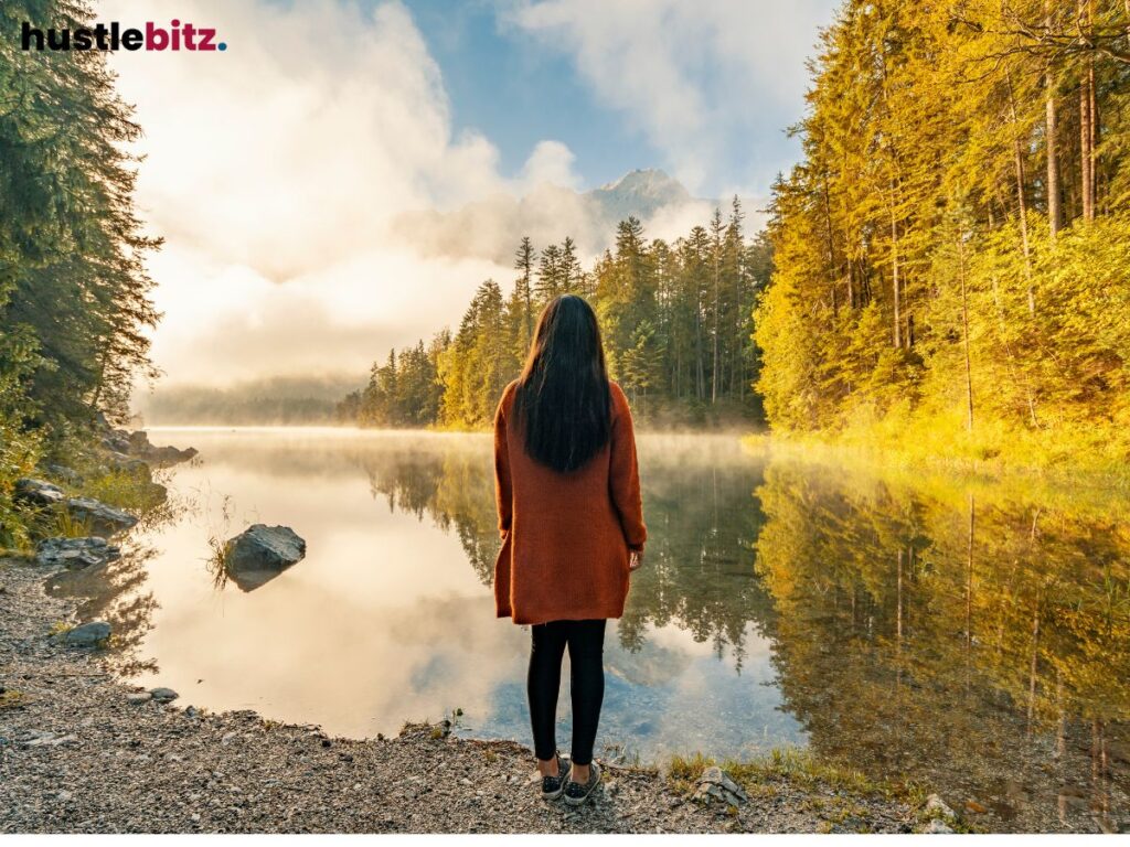 A woman standing in front of the nature