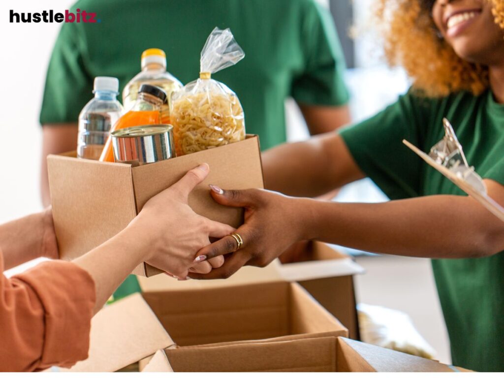 A group of people giving foods to the other people