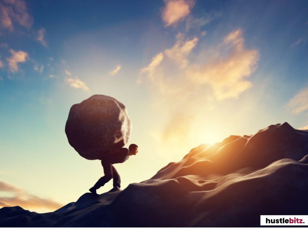 A person holding a rock in the back