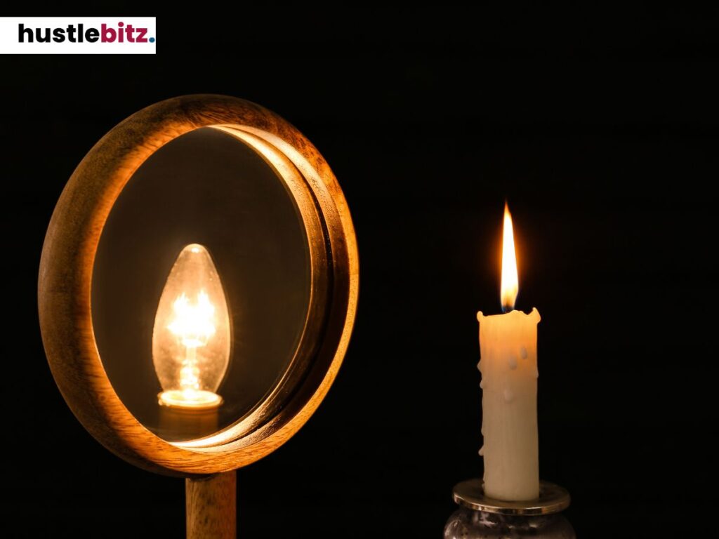 Candle with mirror reflection, representing spreading light.