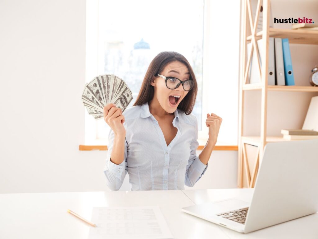 A woman holding money.