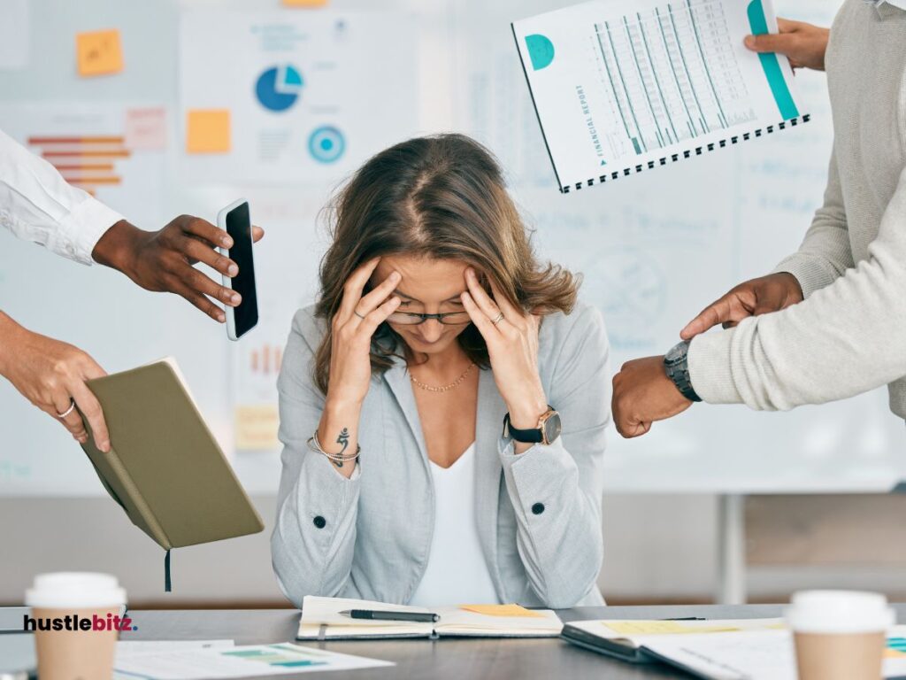 A woman bombarded with work.