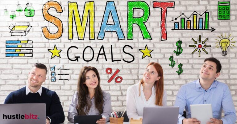 four people looking above with a word Smart Goals