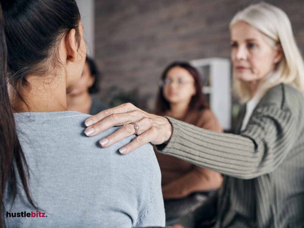  An old woman tap the shoulder of the other woman