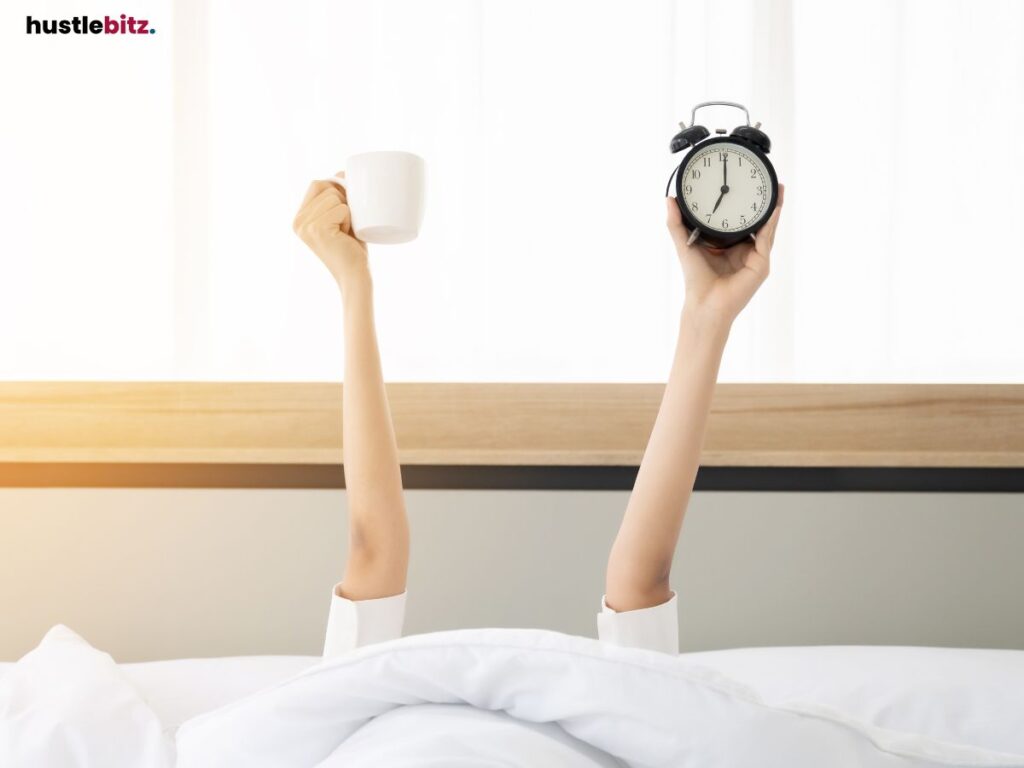 A woman holding up a clock and a mug