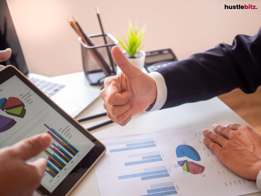 A person giving a thumbs up about work performance