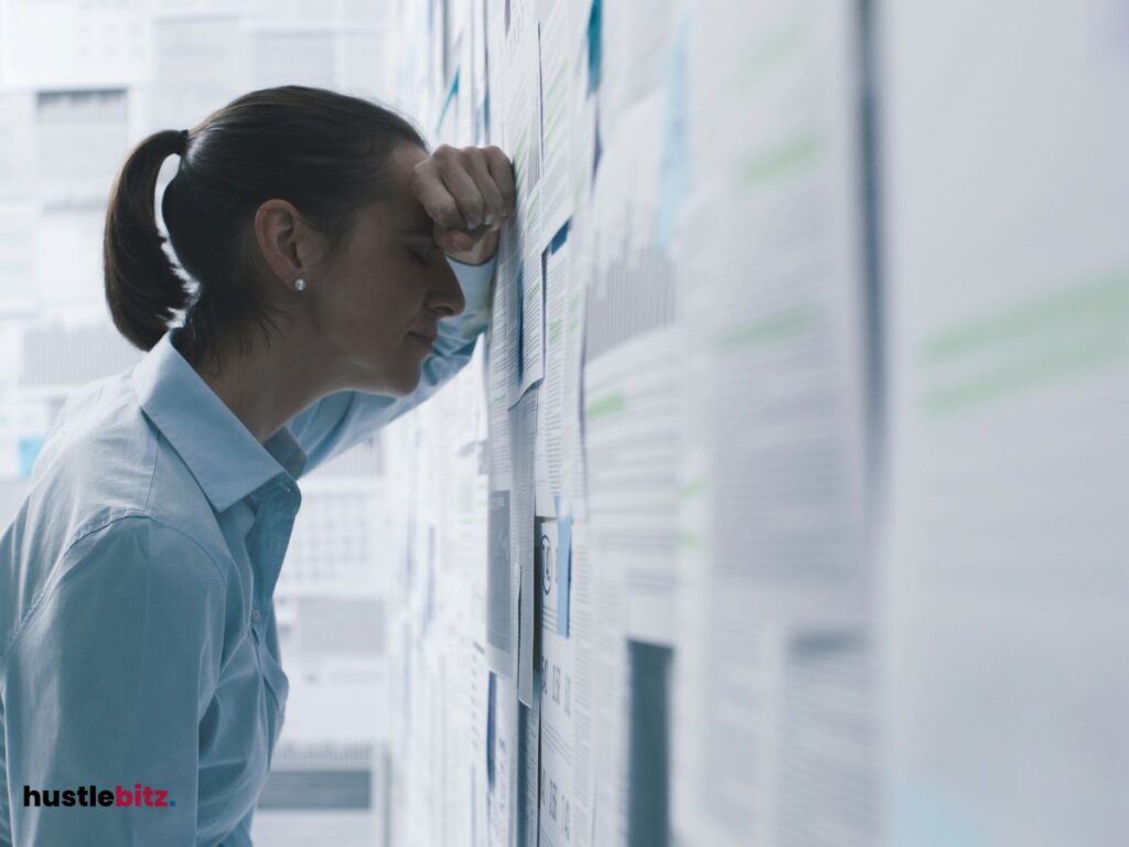 A woman leaning on the board