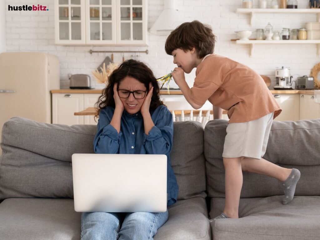 A woman working with her son distracting her