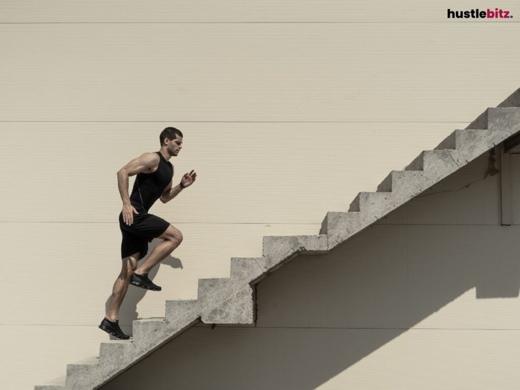 A man jogging in the flight of stairs.