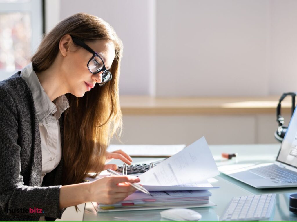 A woman looking at documents