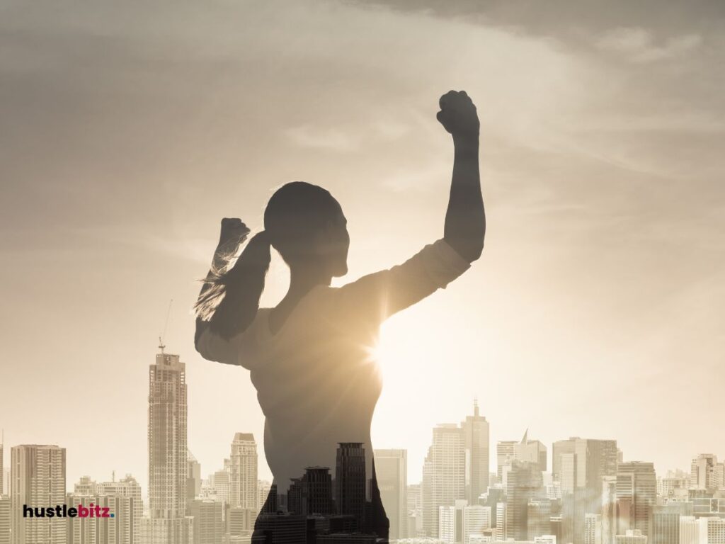 A silhouette of a woman showing her strength