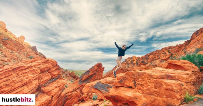 An image of a woman up in the mountain.