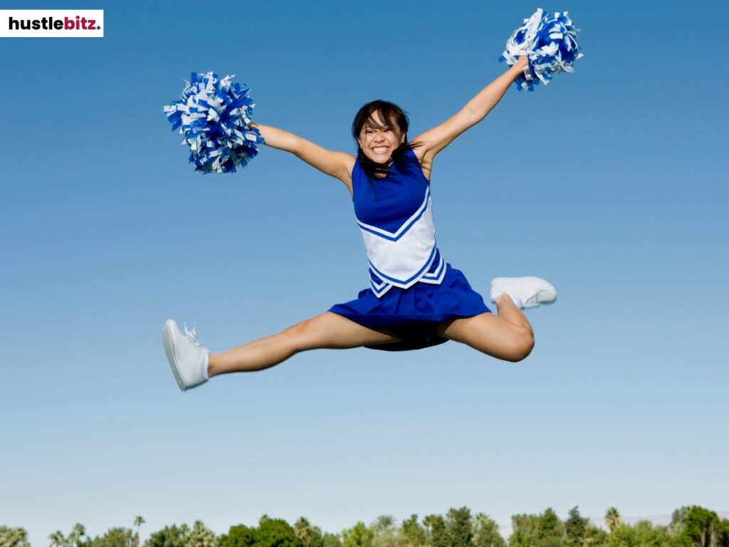 A cheerleader jumping.