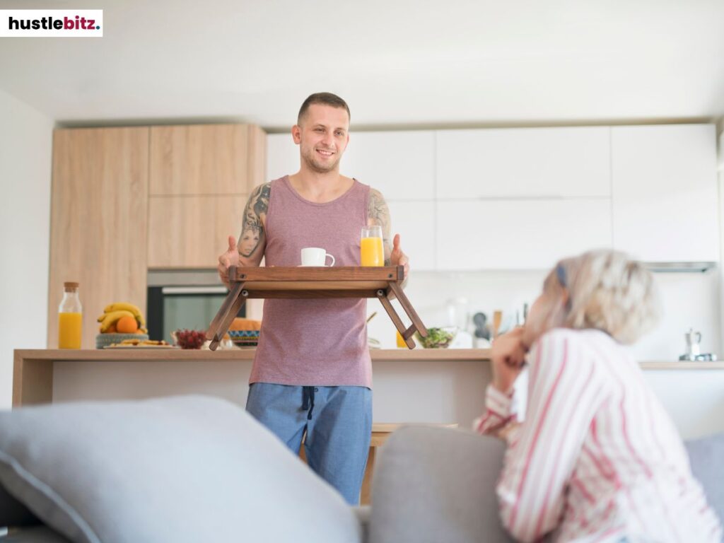 A man holding a tray of food.