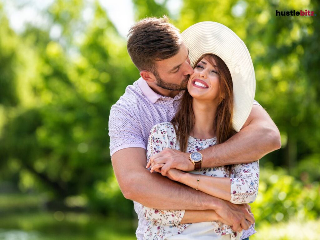 A man and a woman in a loving embrace.