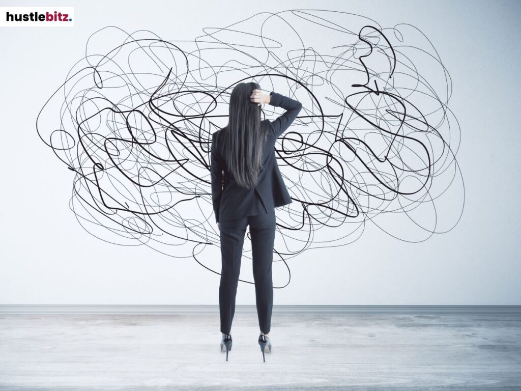 A woman looking at the wall that has random lines.