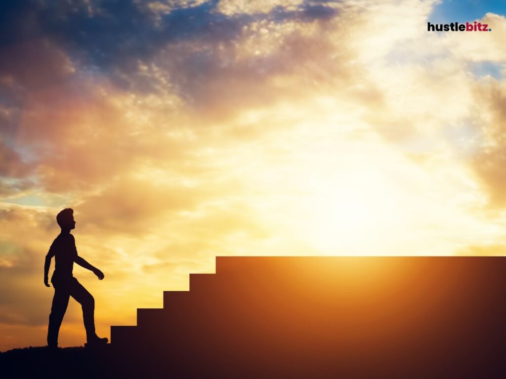 A silhouette of a man climbing the stair.