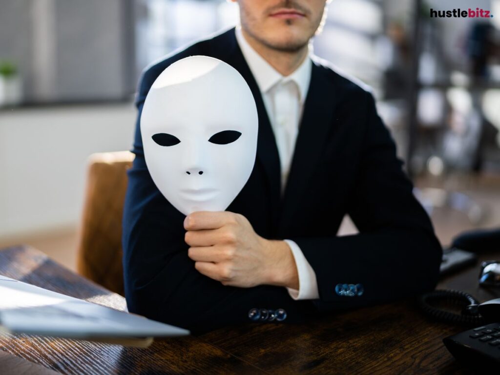 A man holding a mask.