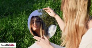 A woman looking at herself in the mirror.