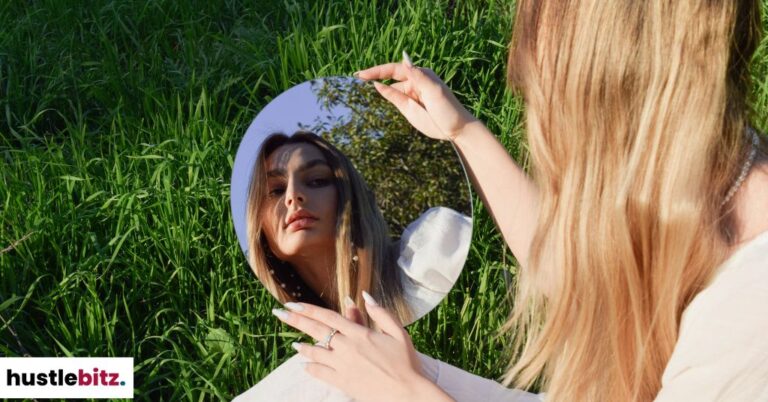 A woman looking at herself in the mirror.