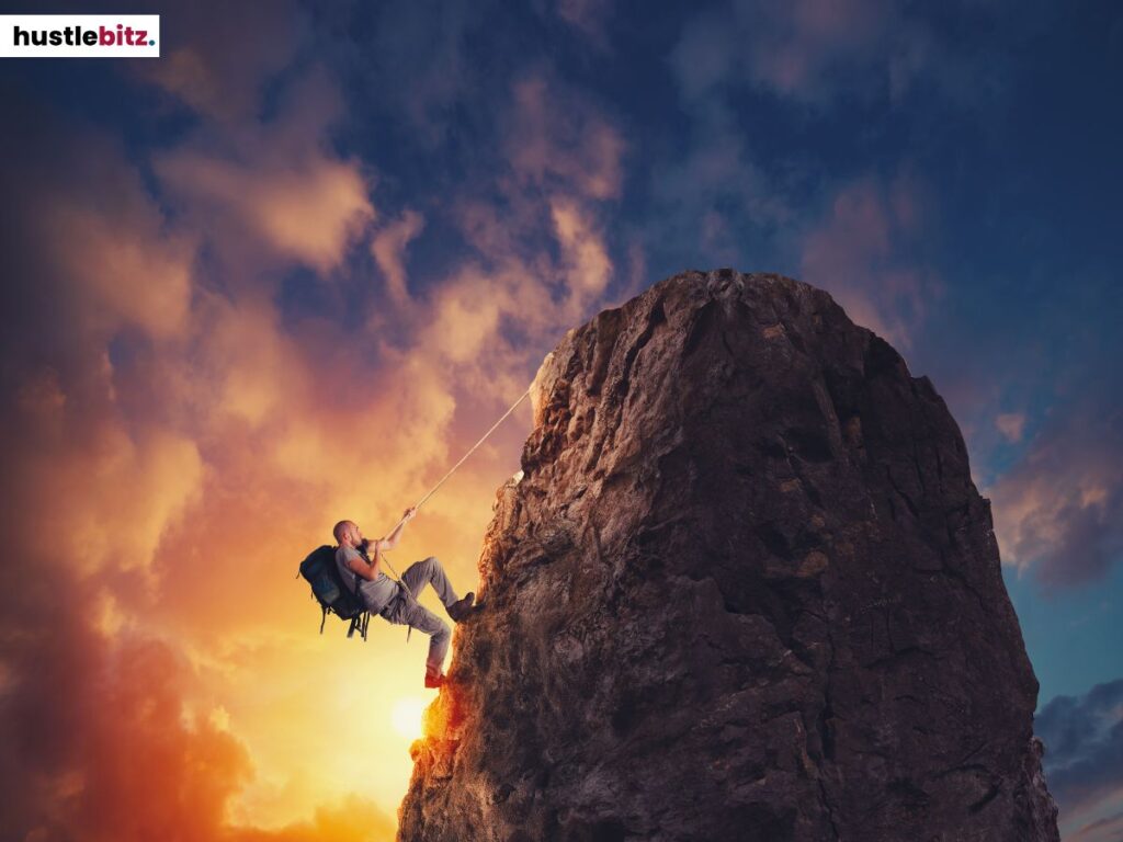 A man climbing a mountain.