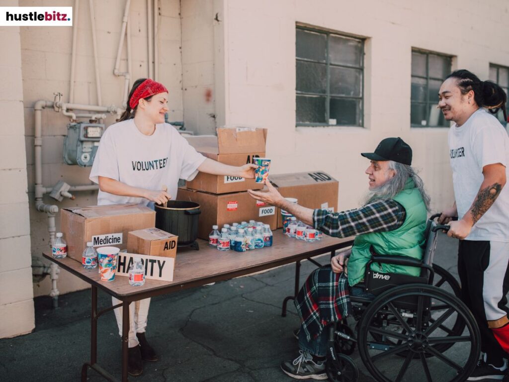 A disabled man receiving donations.