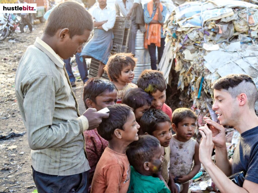 A man talking to children with unfortunate circumstances.