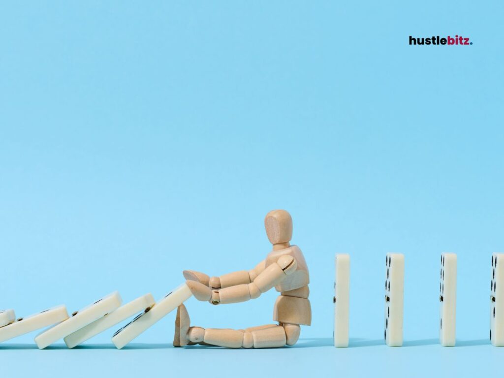 A ragdoll stopping a domino.