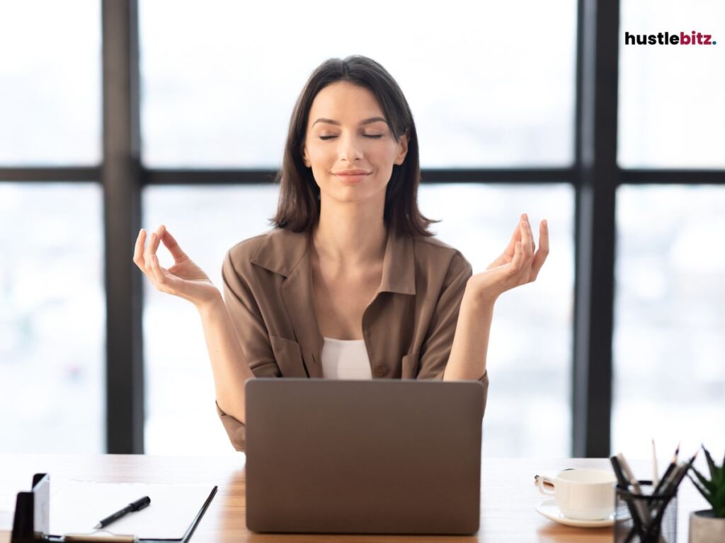 A woman raising both her and doing yoga.