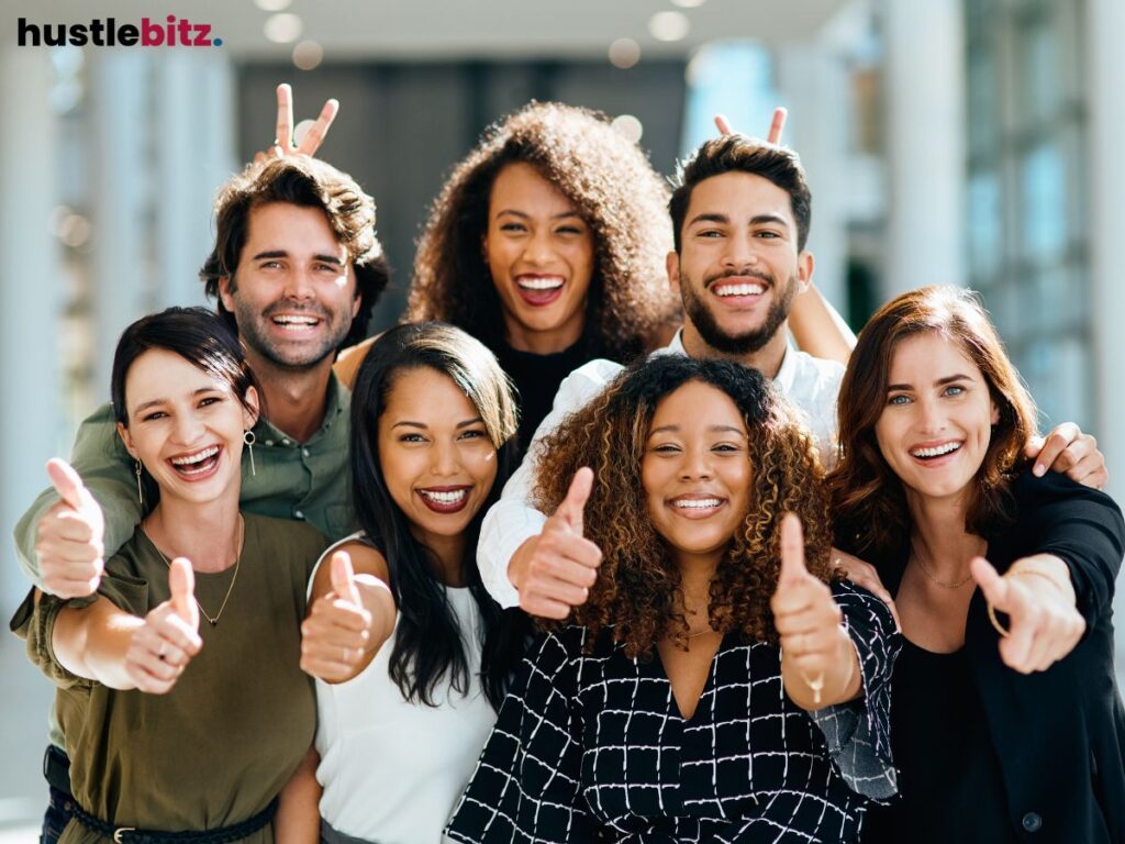 A cheerful group of friends giving thumbs up, radiating joy and positivity.